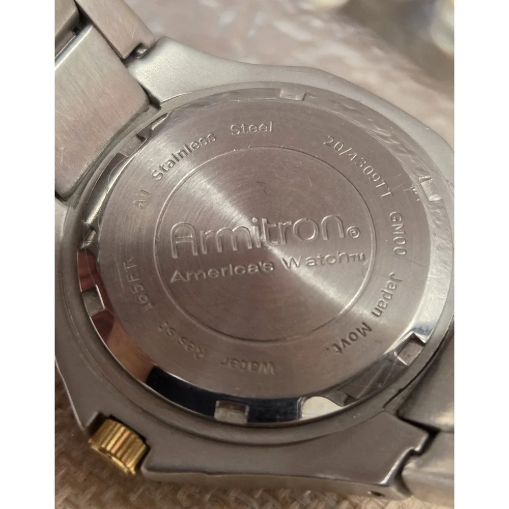 Armitron Day Date Spanish Water Resistant Chrono Stainless Two Tone Watch Quartz